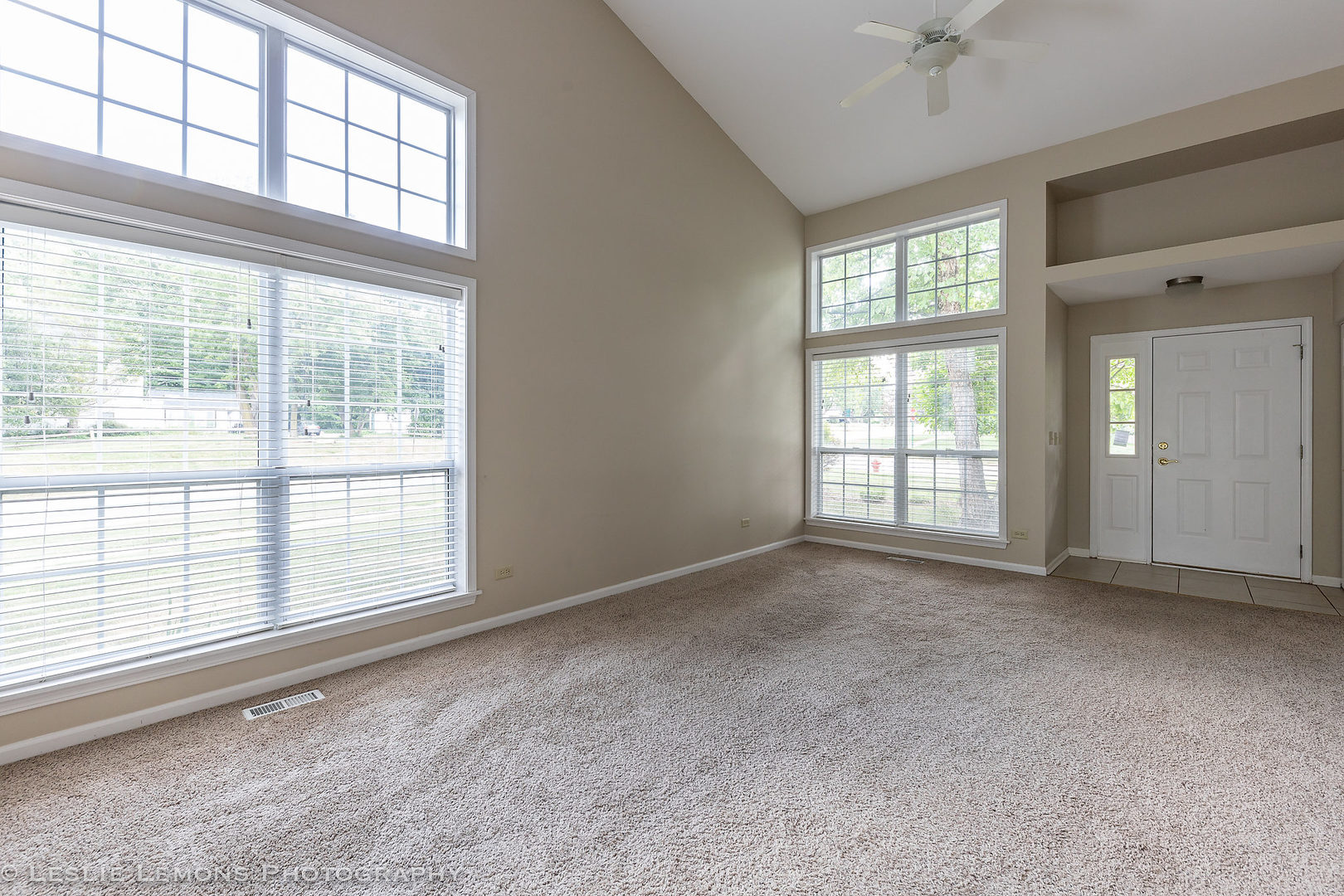 956 Pin Oak Circle Cary, IL 60013 - Photo 3 of 31 a view of an empty room with a window