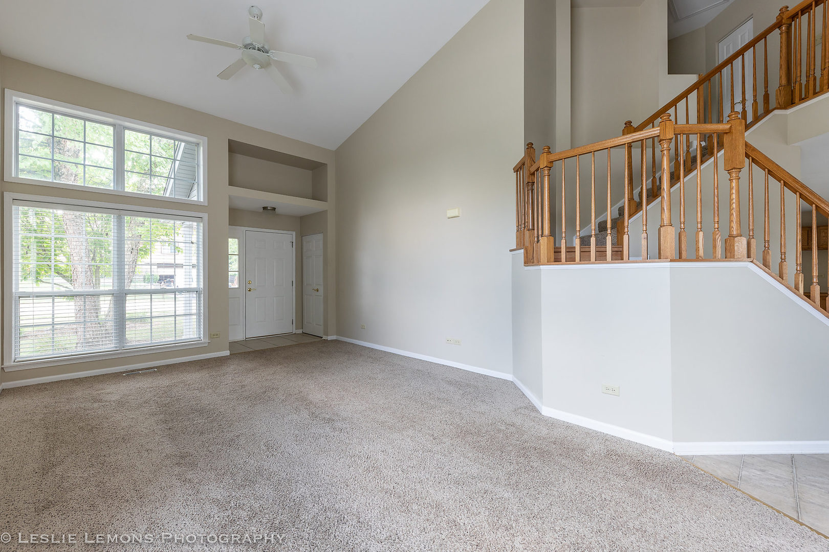 956 Pin Oak Circle Cary, IL 60013 - Photo 4 of 31 wooden floor in an empty room with a window