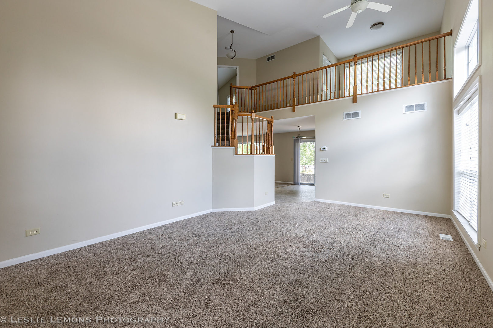 956 Pin Oak Circle Cary, IL 60013 - Photo 6 of 31 a view of a hallway with wooden cabinet and door