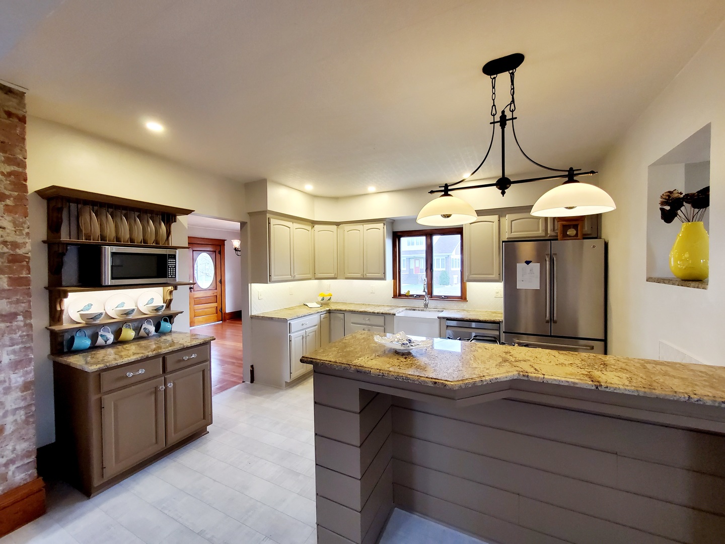 301 2nd Street Danforth, IL 60930 - Photo 8 of 50 a kitchen with a stove and a wooden floor