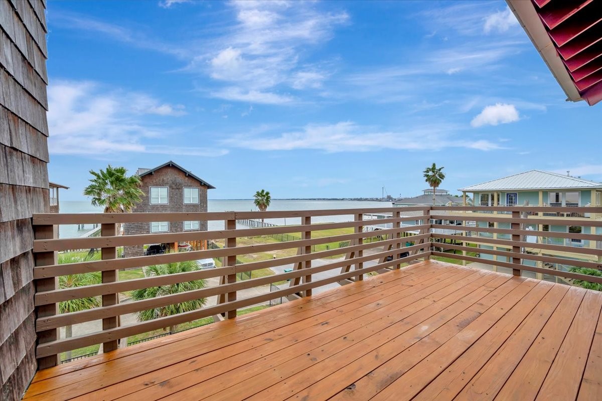 1202 Todville Road Seabrook, TX 77586 - Photo 36 of 45 Nice size balcony off the primary bedroom. Perfect for wachting the fireworks on the bay