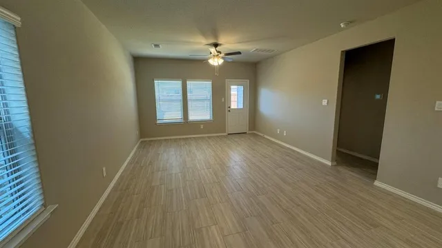 a view of a house with a barbeque