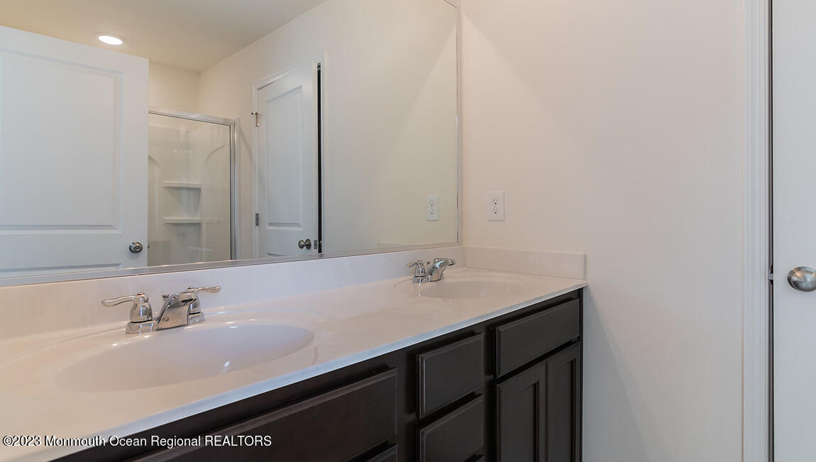35 Phoebe Drive Barnegat, NJ 08005 - Photo 15 of 21 a bathroom with a sink and a mirror