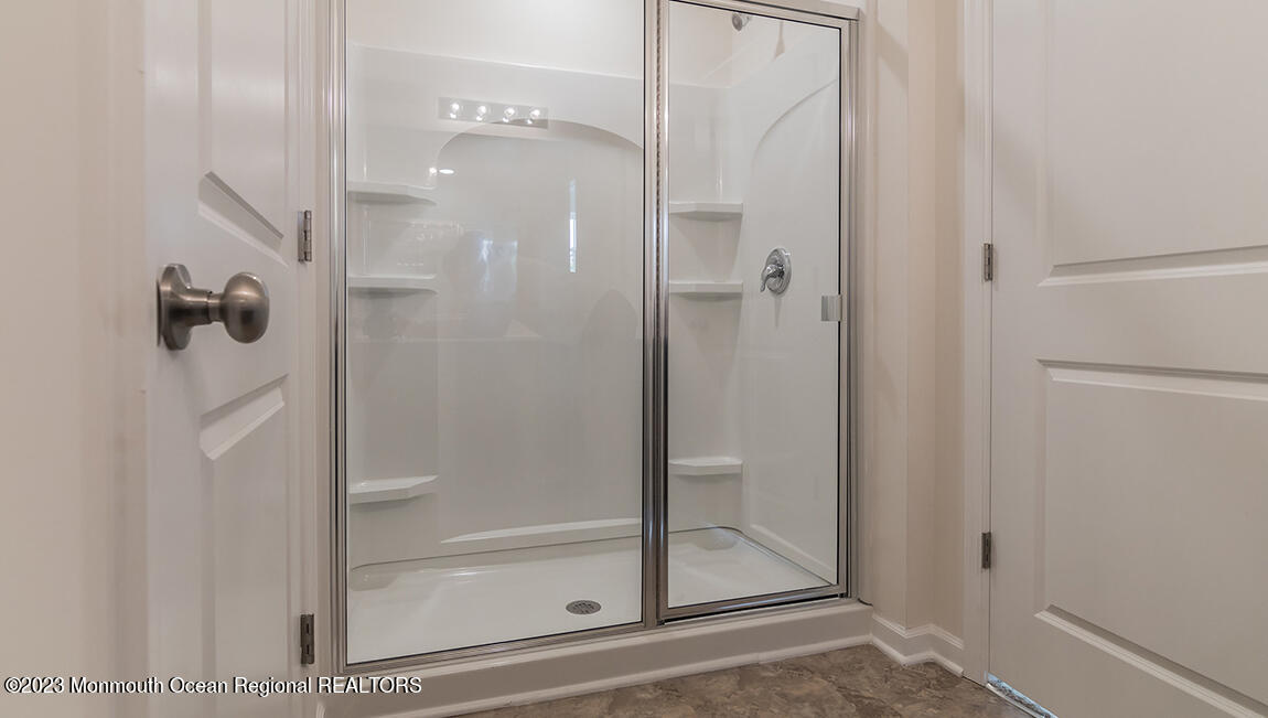 35 Phoebe Drive Barnegat, NJ 08005 - Photo 16 of 21 a bathroom with a glass shower door