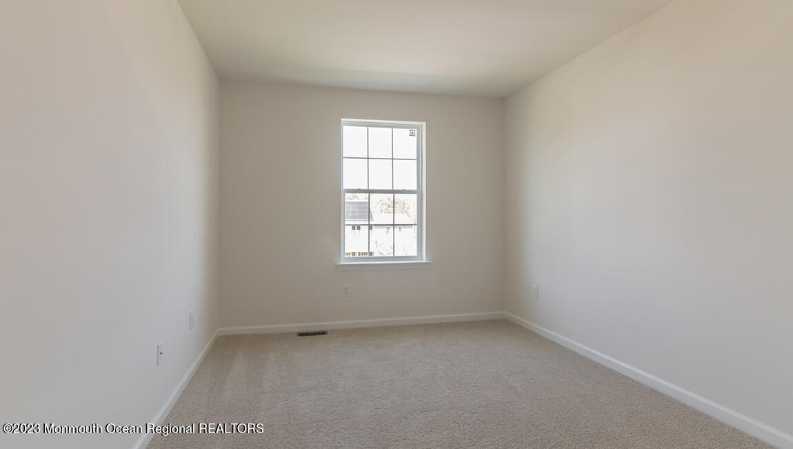 35 Phoebe Drive Barnegat, NJ 08005 - Photo 18 of 21 an empty room with a window