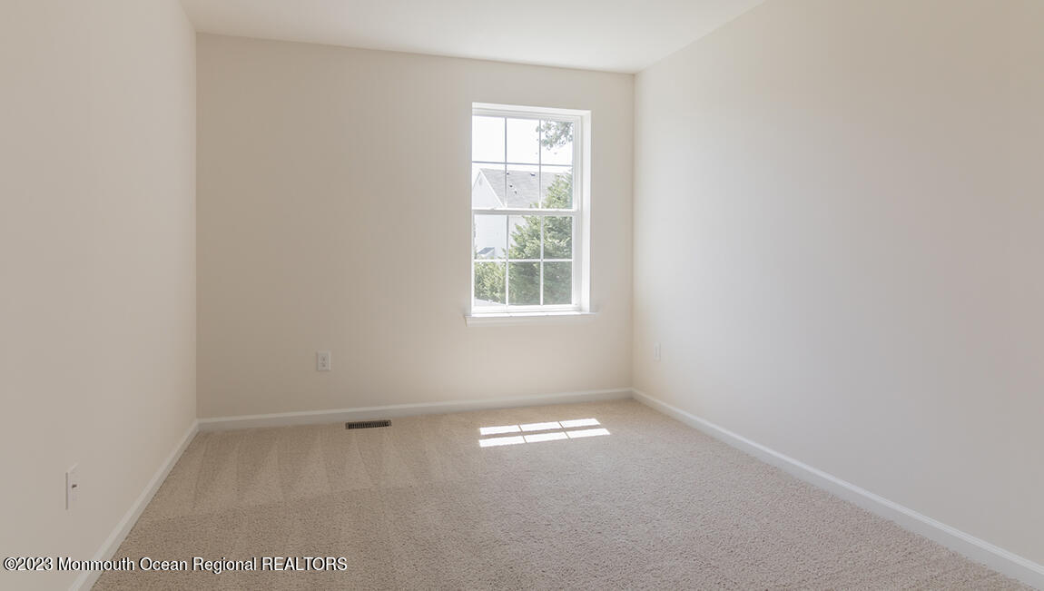 35 Phoebe Drive Barnegat, NJ 08005 - Photo 21 of 21 an empty room with a window