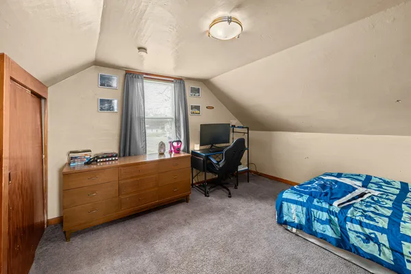 a room with furniture and a window