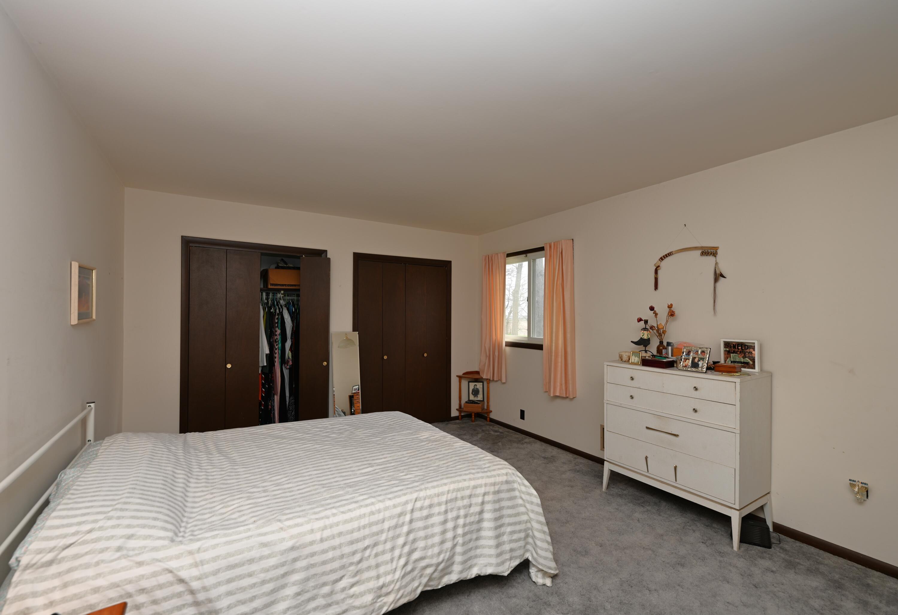 5110 West 400 North Winamac, IN 46996 - Photo 29 of 35 a bedroom with a bed and a dresser