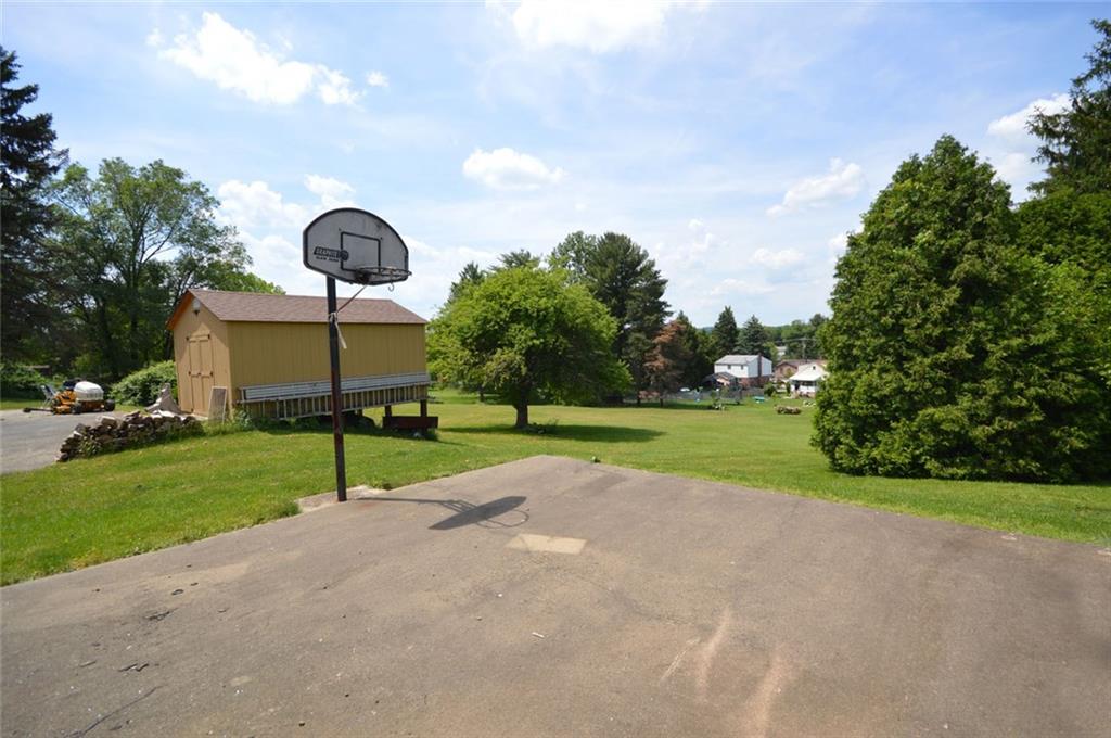 306 Old Lesnett Road Pittsburgh, PA 15241 - Photo 22 of 24 Great play area off the three season room is located safely in the backyard.