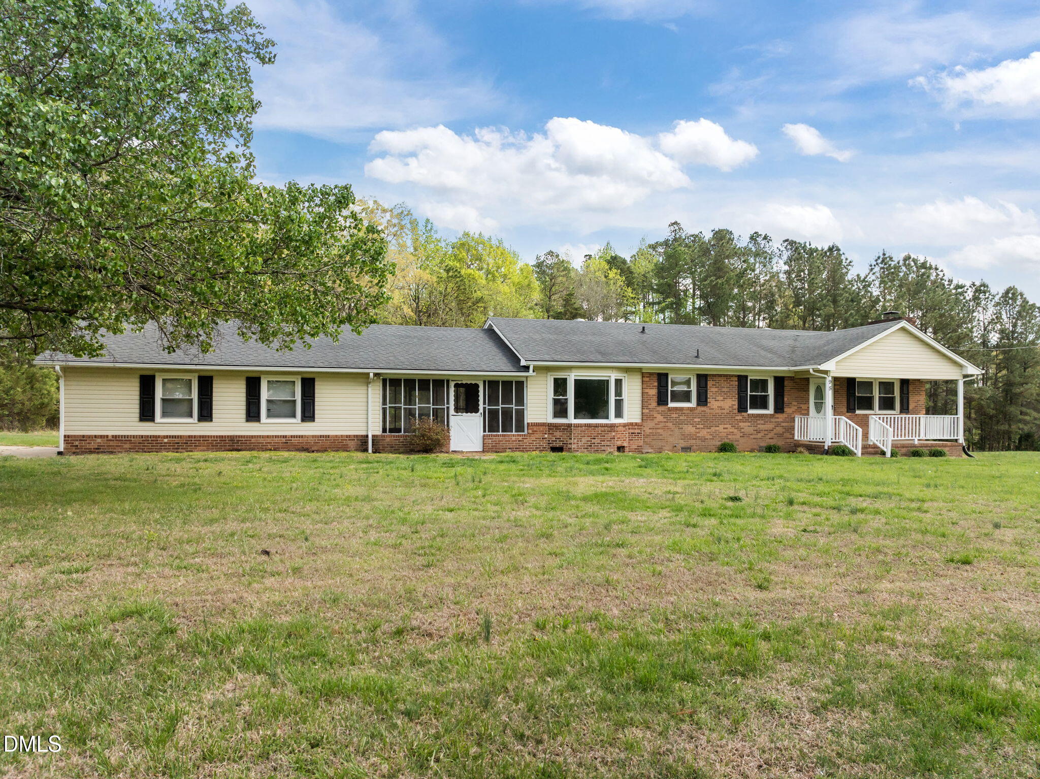 95 Harold Gill Road Roxboro, NC 27574 - Photo 40 of 53 a front of a house with a garden