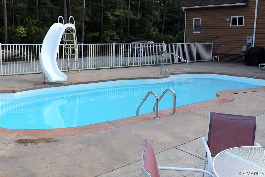 6401 Moseley Road Moseley, VA 23120 - Photo 25 of 34 Gorgeous 34x16 Fiberglass Pool With Cement Patio Surround