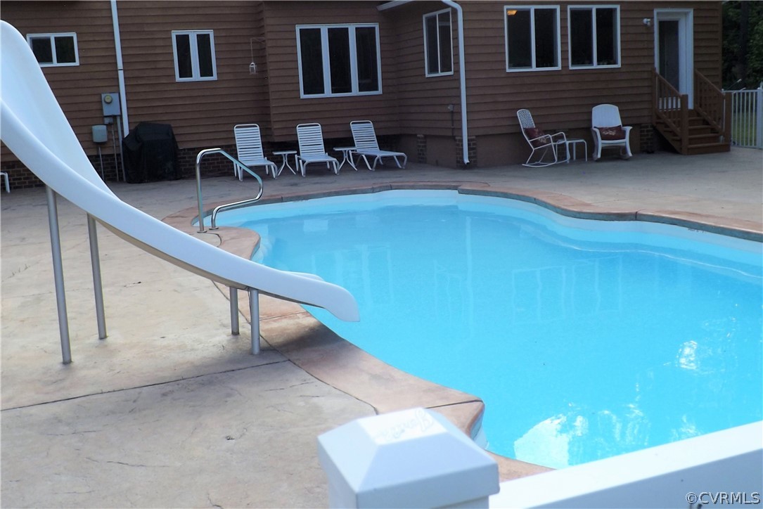 6401 Moseley Road Moseley, VA 23120 - Photo 26 of 34 Poo Has an Eight Foot Curved Slide