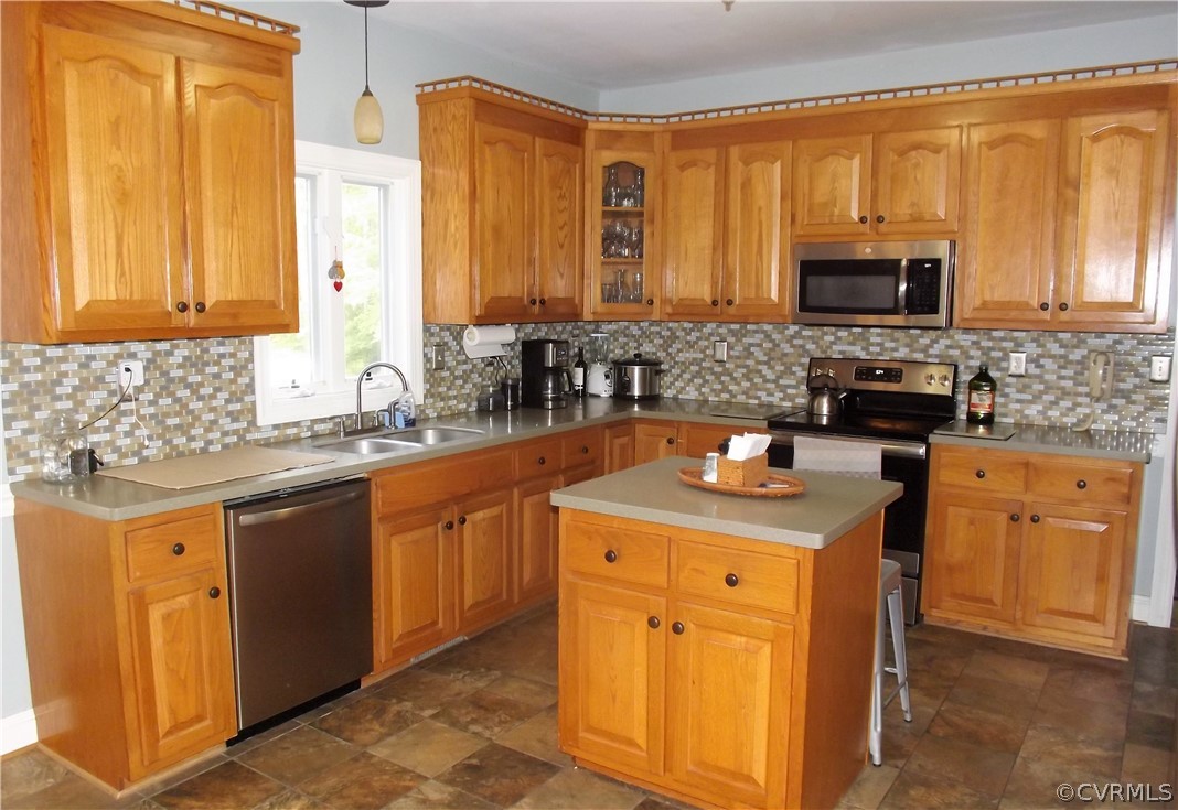 Ceramic Tile Back Splash and Stainless Steele Appliances