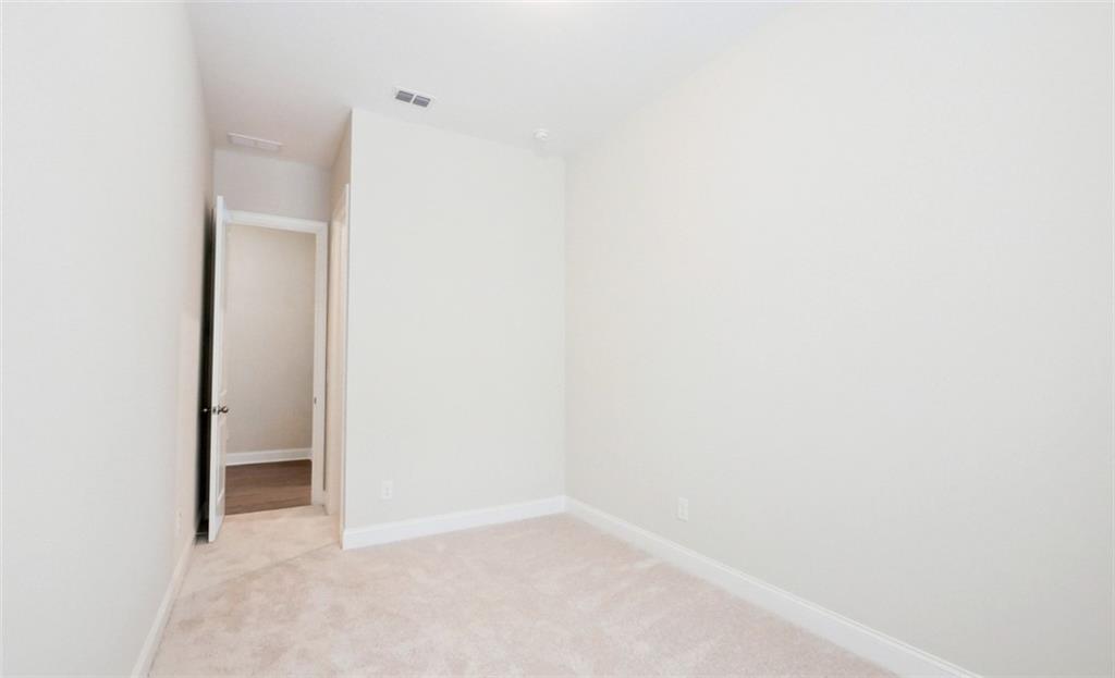 726 Stickley Oak Way Woodstock, GA 30189 - Photo 25 of 40 a view of an empty room