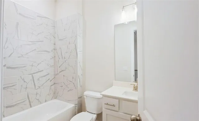 a view of a utility room with a sink