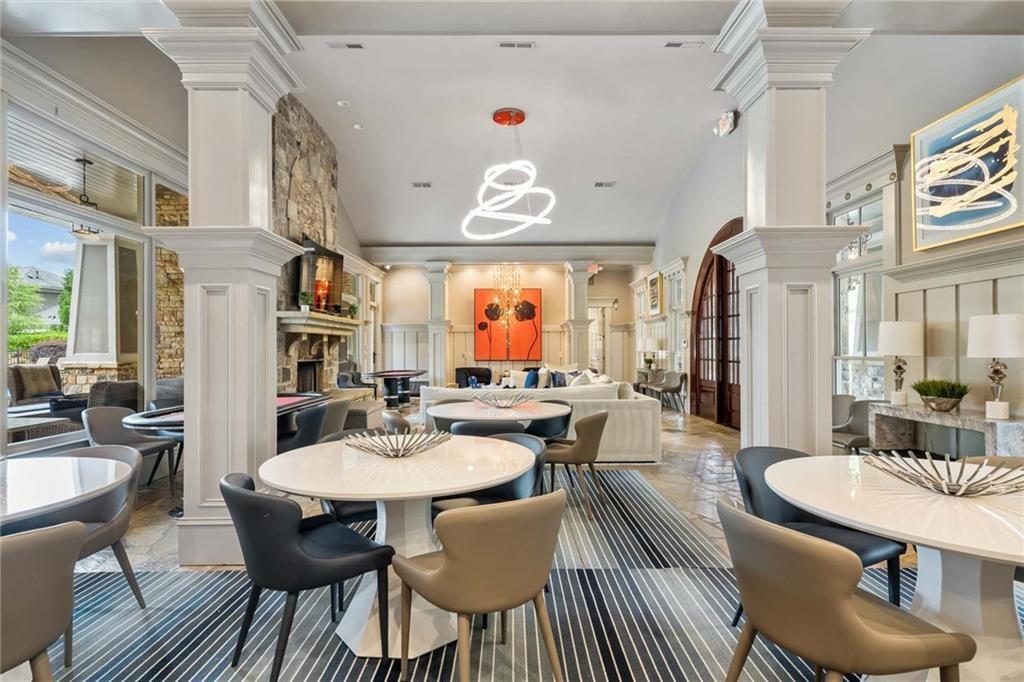 726 Stickley Oak Way Woodstock, GA 30189 - Photo 33 of 40 a view of a dining room with furniture