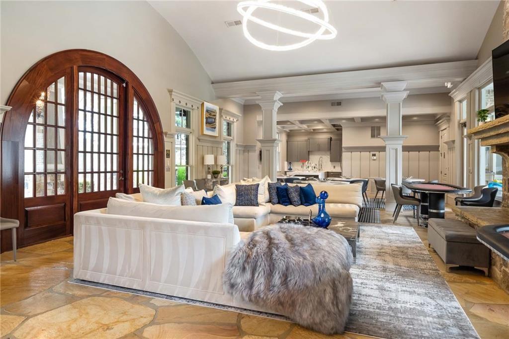 726 Stickley Oak Way Woodstock, GA 30189 - Photo 35 of 40 a living room with furniture and a large window
