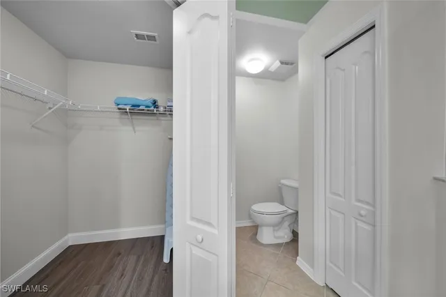 a view of a room with racks on the wall