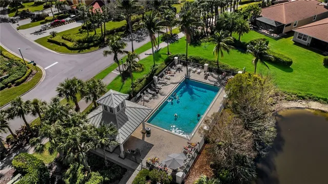 a house with flowers in front of it