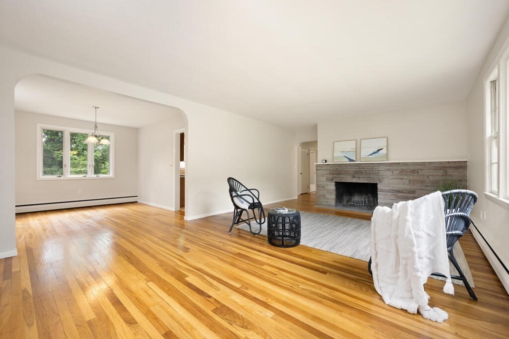 7 Riverview Avenue Maynard, MA 01754 - Photo 5 of 35 a view of livingroom with furniture and a fireplace
