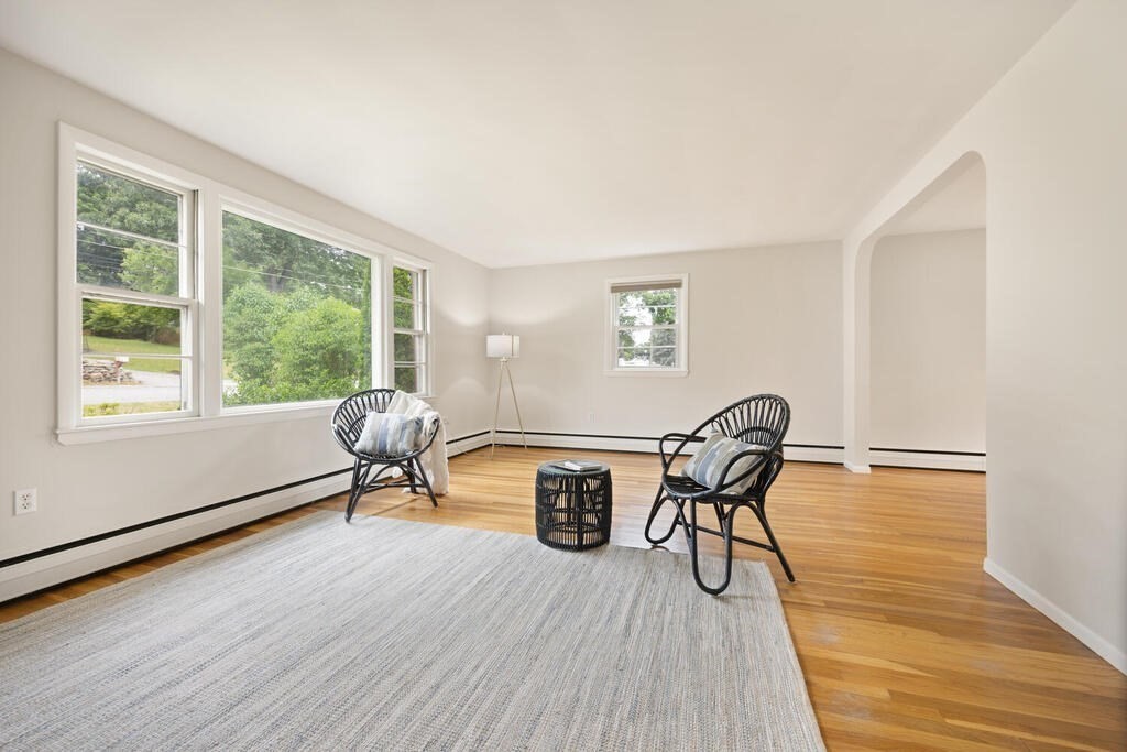 7 Riverview Avenue Maynard, MA 01754 - Photo 7 of 35 a living room with furniture and a wooden floor