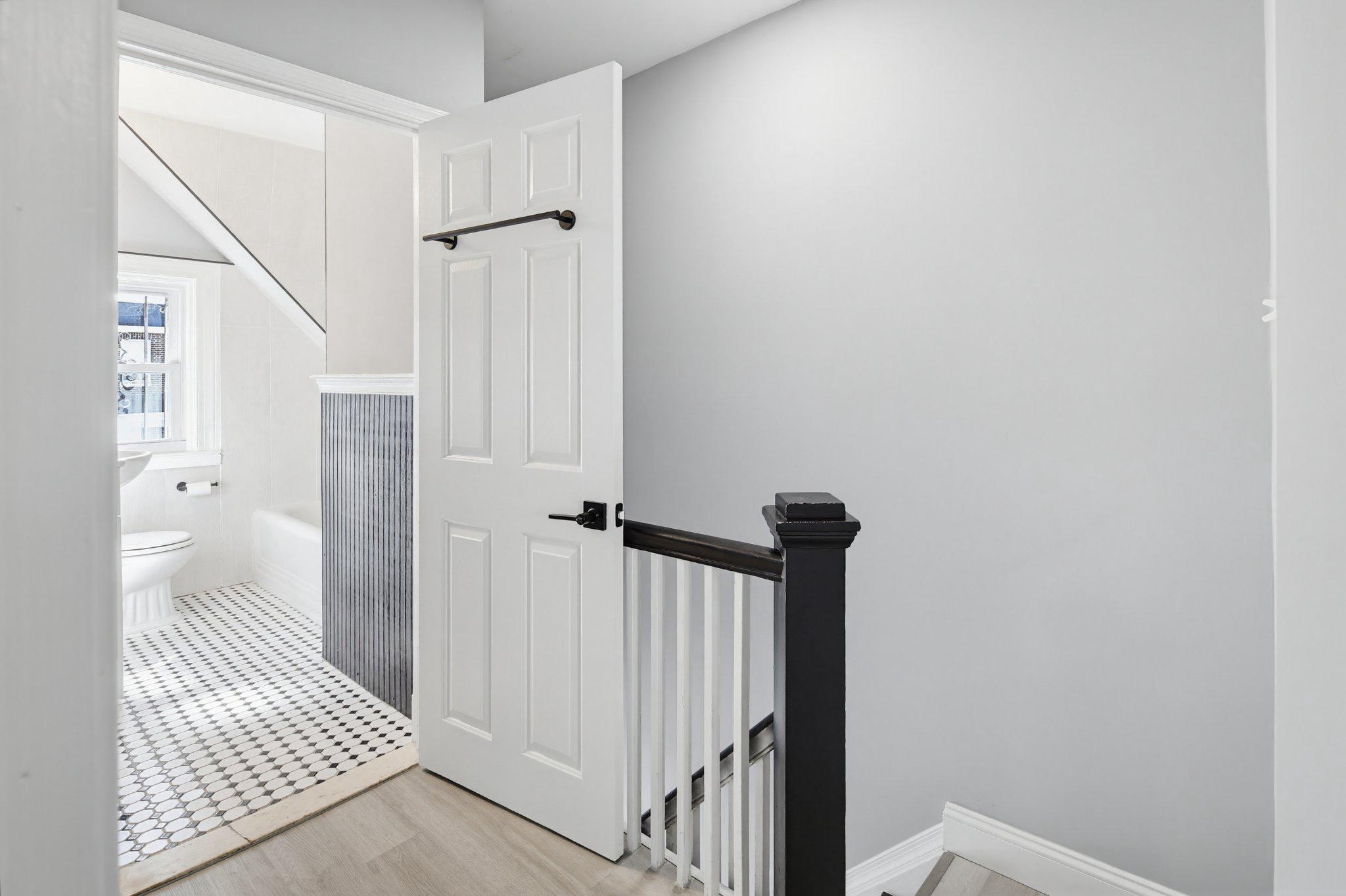 12 North Rosedale Street Baltimore, MD 21229 - Photo 11 of 25 Bright and airy hallway to Full Bathroom
