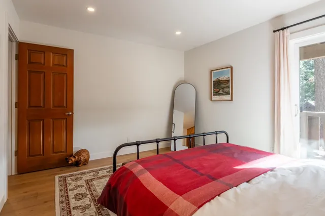 a view of a closet area with window in it