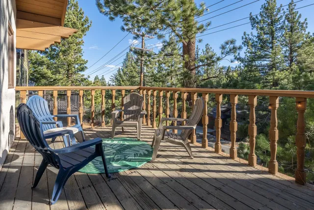 a view of balcony with furniture