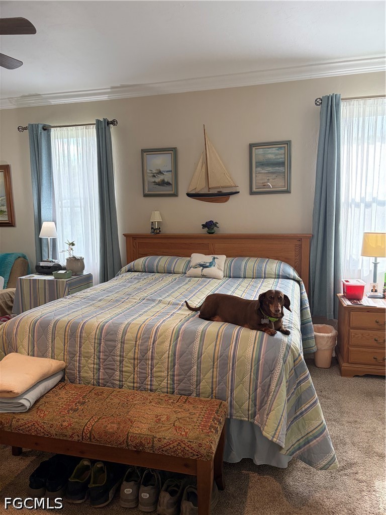 92 Evergreen Road North Fort Myers, FL 33903 - Photo 17 of 30 a bedroom with a bed and window