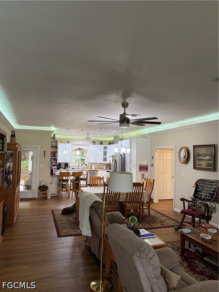 92 Evergreen Road North Fort Myers, FL 33903 - Photo 22 of 30 a living room with lots of furniture and a view of kitchen