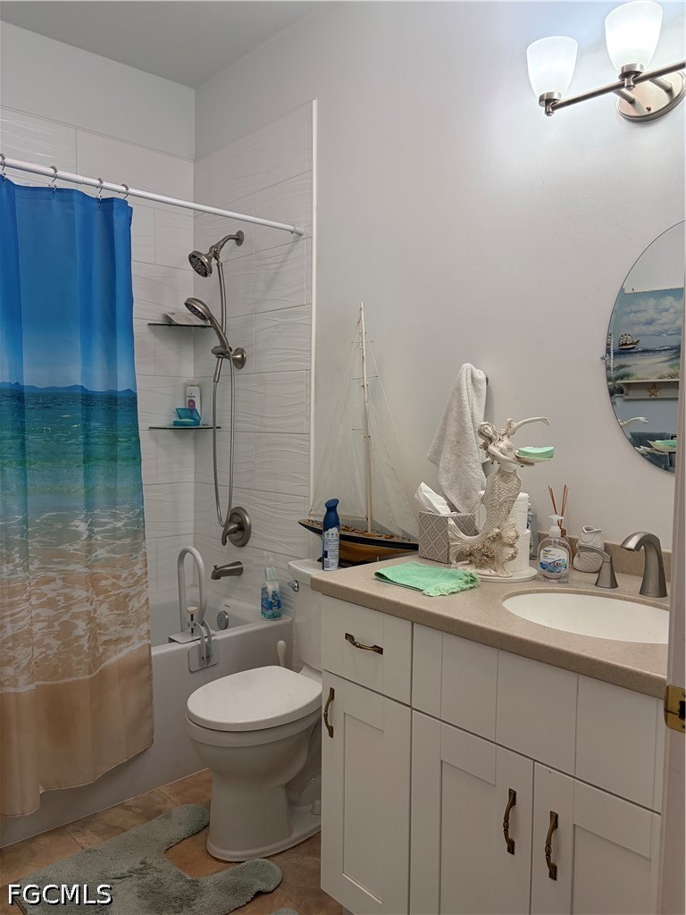 92 Evergreen Road North Fort Myers, FL 33903 - Photo 25 of 30 a bathroom with a toilet sink and mirror