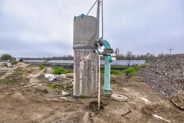 a view of a lake with a building in the background