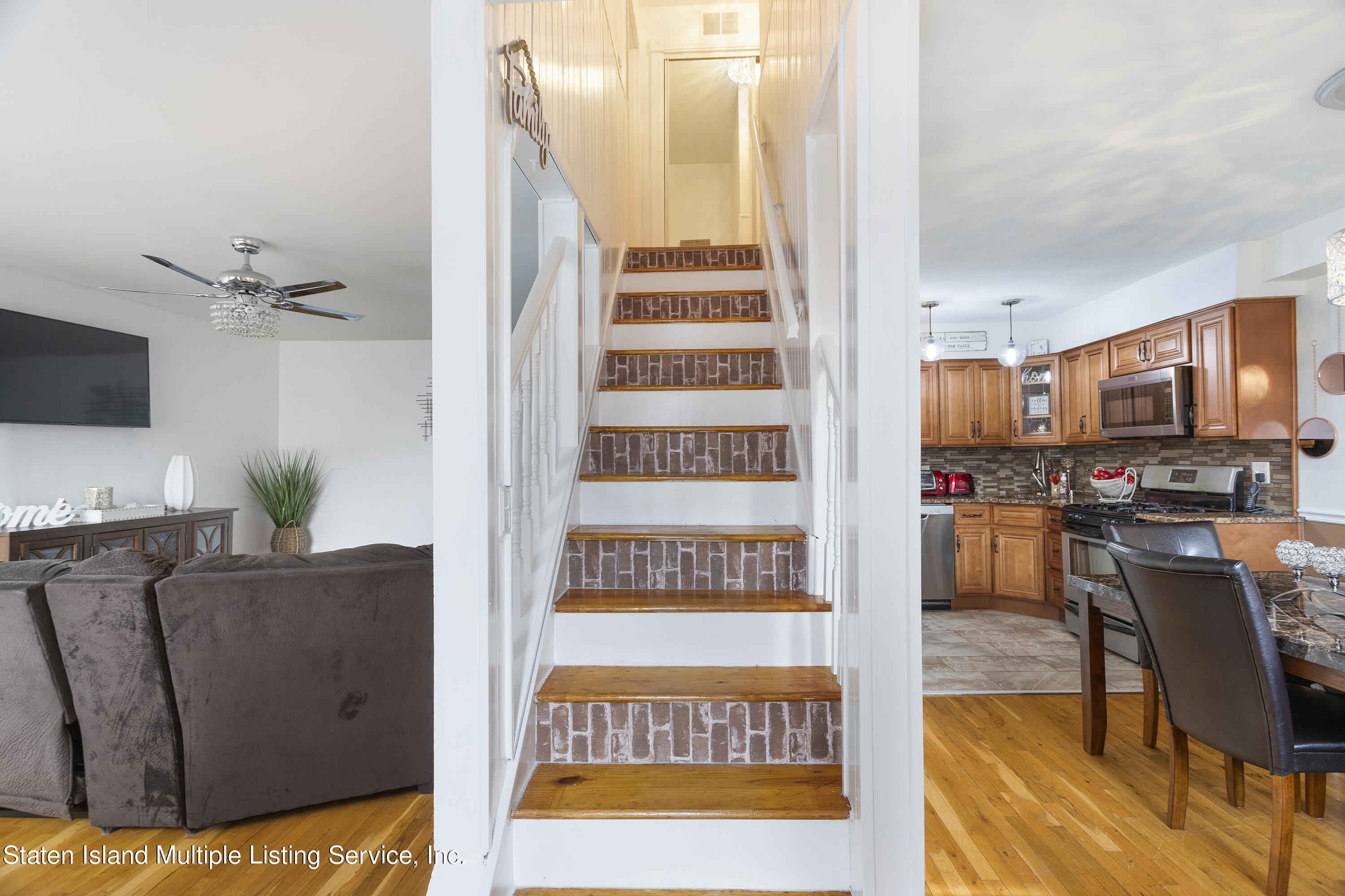 403-1 Willow Road East, Unit 1 Staten Island, NY 10314 - Photo 5 of 14 a view of a living room and dining area