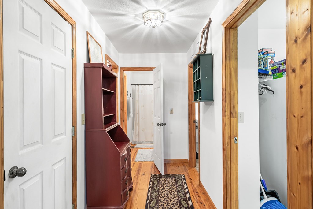 1628 Woods Valley Road Young Harris, GA 30582 - Photo 13 of 36 a view of hallway with stairs and furniture