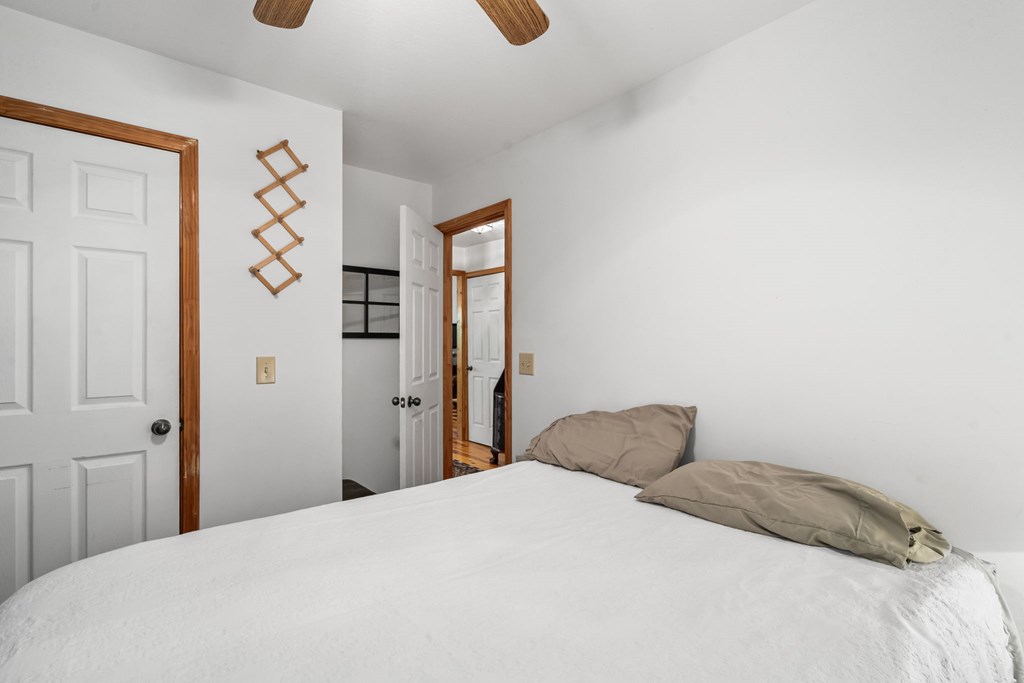 1628 Woods Valley Road Young Harris, GA 30582 - Photo 18 of 36 a bedroom with a bed and a window