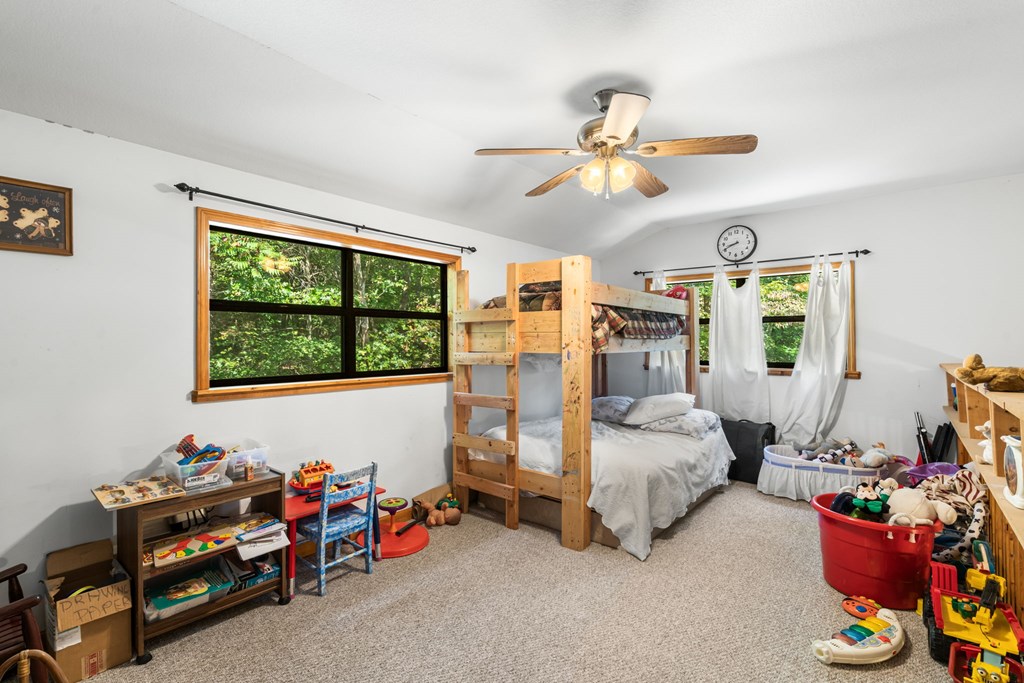 1628 Woods Valley Road Young Harris, GA 30582 - Photo 21 of 36 a bedroom with bed and window