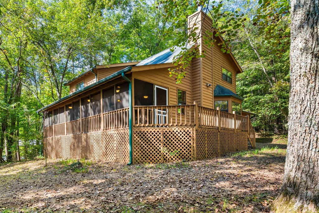 1628 Woods Valley Road Young Harris, GA 30582 - Photo 3 of 36 a view of a house with a yard