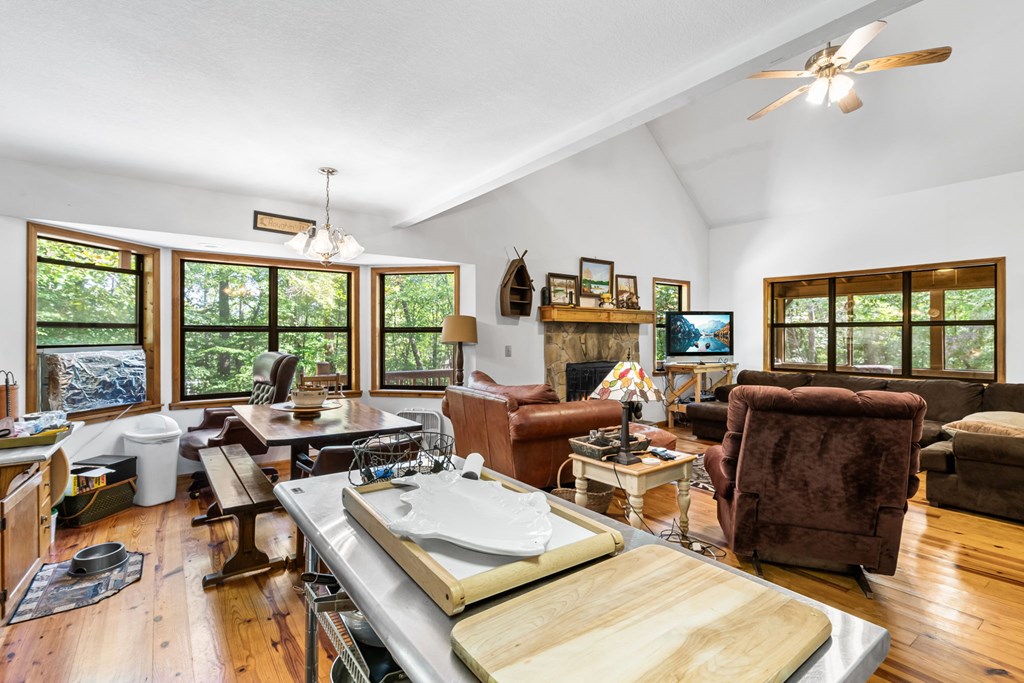 1628 Woods Valley Road Young Harris, GA 30582 - Photo 9 of 36 a living room with furniture and a large window