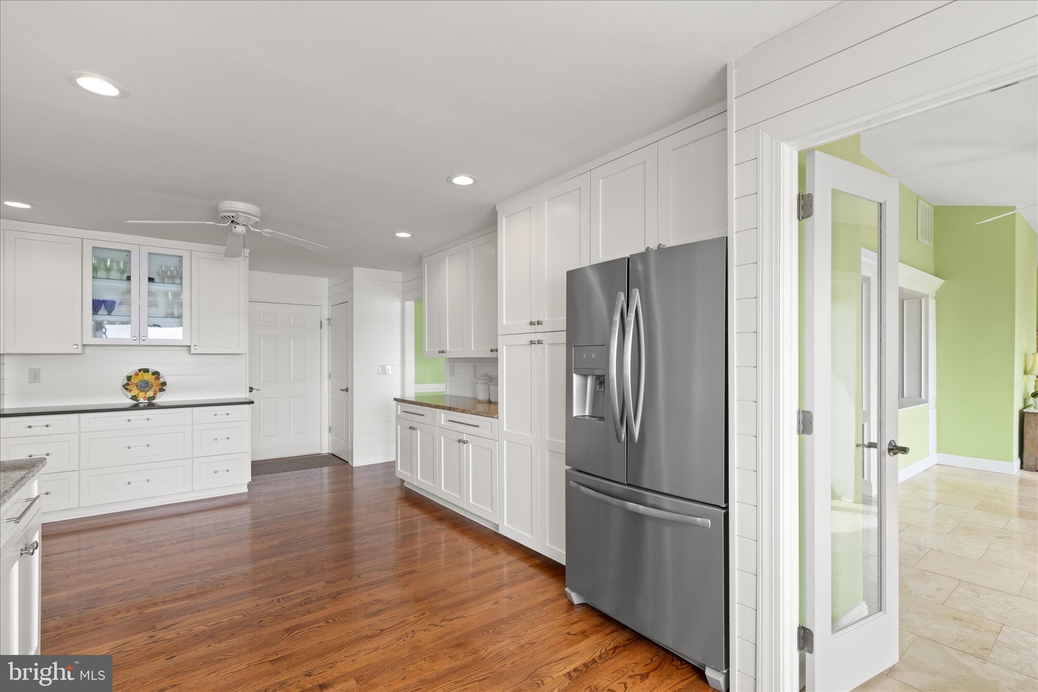 24818 Half Pone Point Road Hollywood, MD 20636 - Photo 23 of 60 Laundry room and half bath adjoining the kitchen