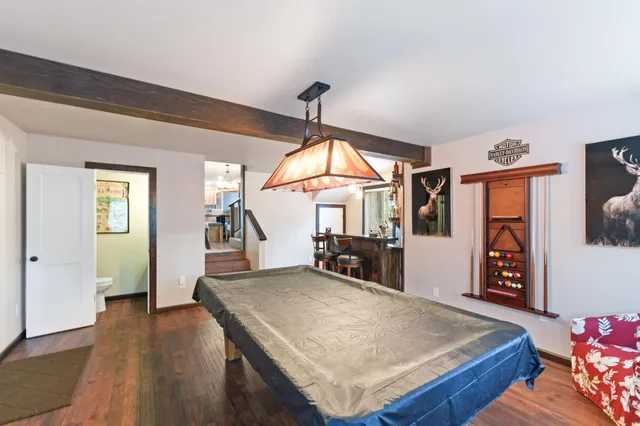 a view of a livingroom with furniture and window
