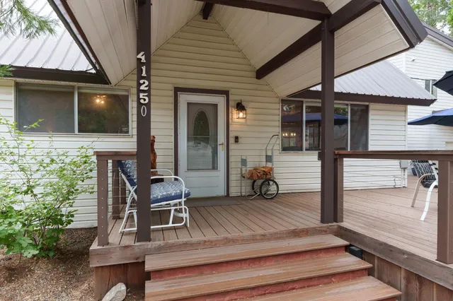 a view of a two chair in the patio
