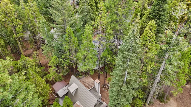 a backyard of a house with wooden floor