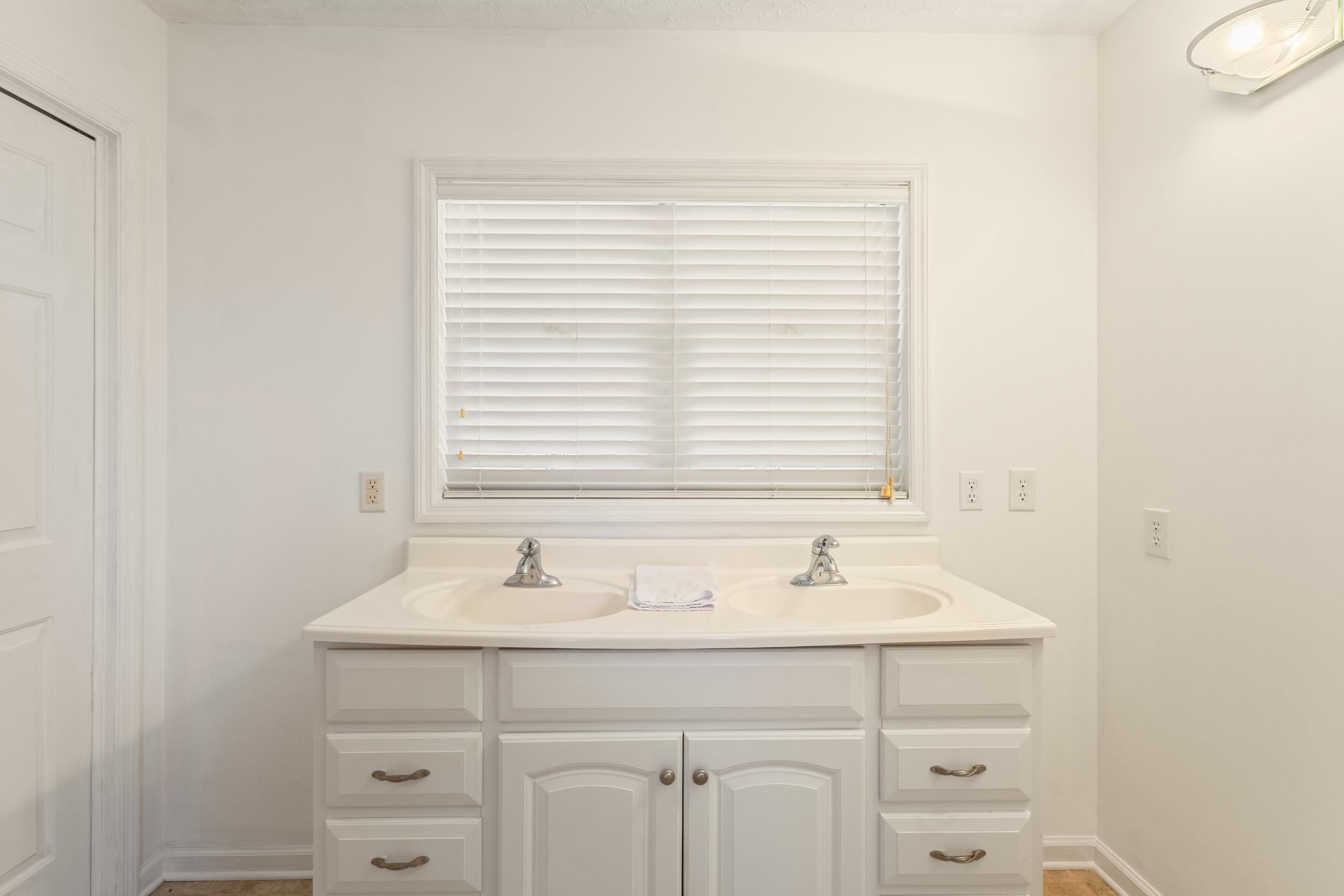 3923 State Rd S-26-33 Green Sea, SC 29545 - Photo 24 of 40 Full bath with double vanity and baseboards