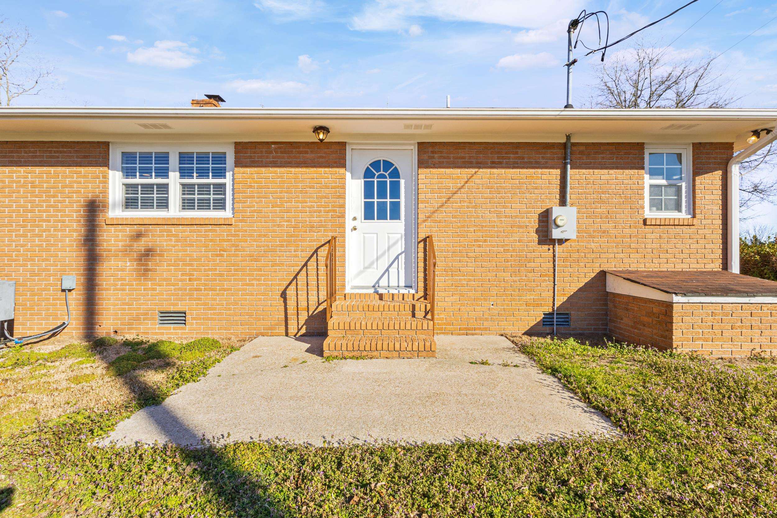3923 State Rd S-26-33 Green Sea, SC 29545 - Photo 36 of 40 Back of property with crawl space, brick siding, entry steps, and a patio