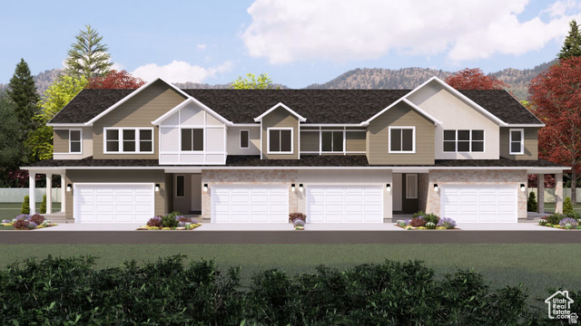34 South Lunar Way Mapleton, UT 84664 - Photo 1 of 1 Townhome / multi-family property featuring a garage, stone siding, and a mountain view