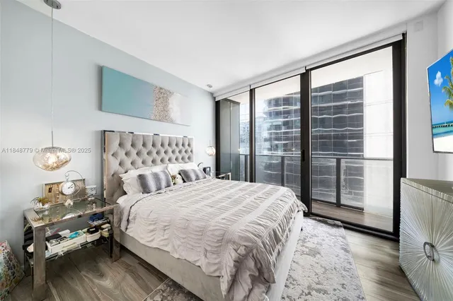 a bathroom with a sink a shower and a mirror