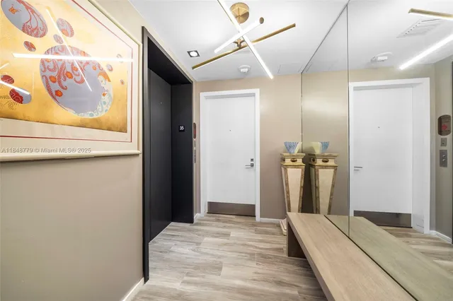a view of a patio with couches table and chairs and potted plants