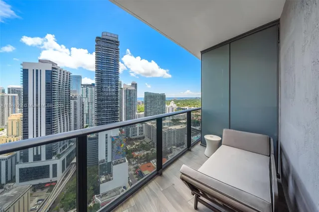 a view of balcony with wooden floor