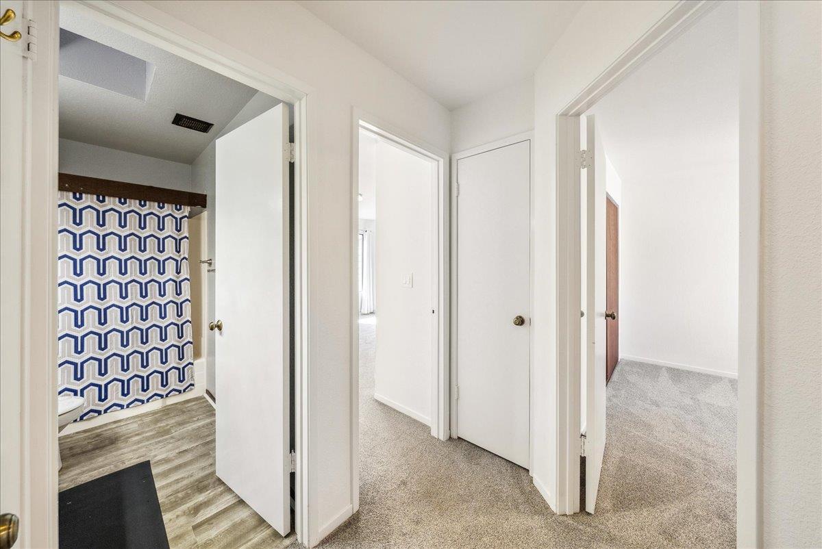3095 Marina Drive, Unit 2 Marina, CA 93933 - Photo 15 of 25 a view of a hallway with wooden floor and staircase