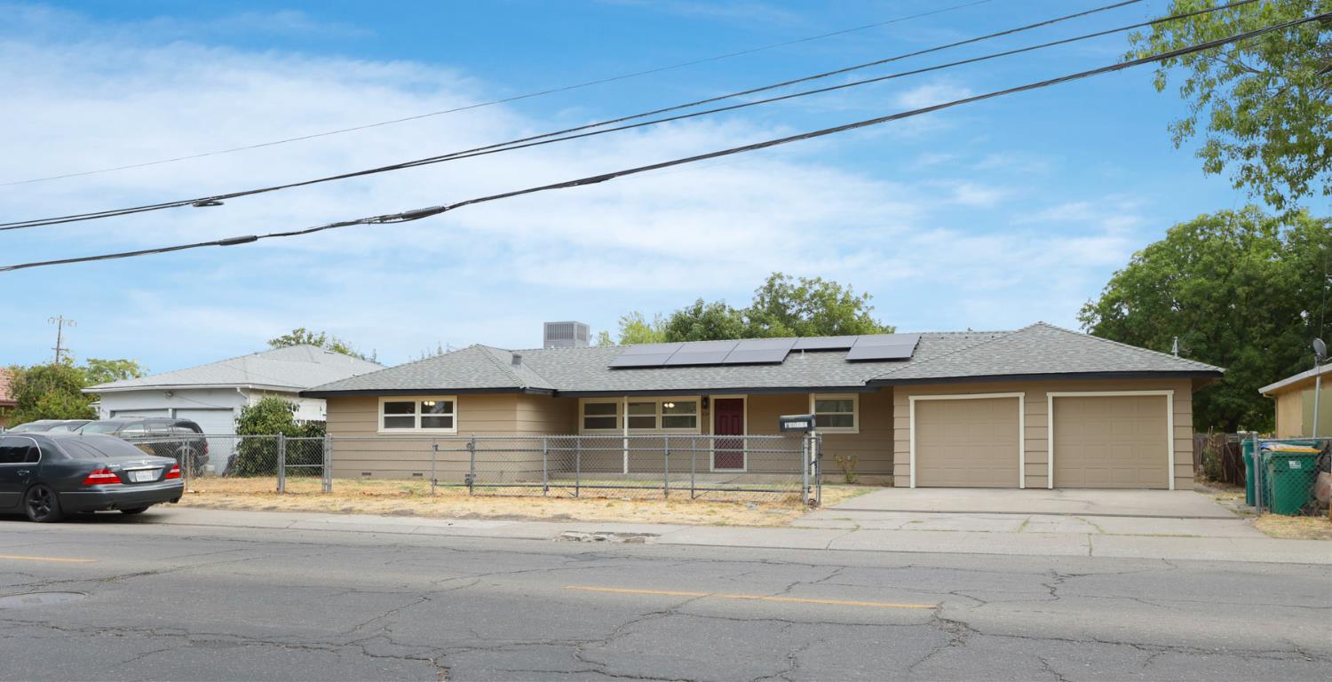 834 North Filbert Street Stockton, CA 95205 - Photo 2 of 22 a front view of a house with garden
